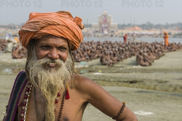 Guru guiding the initiation of new sadhus at the Sangam