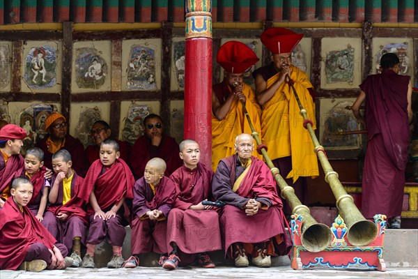 Monks making music as part of the opening ceremony of the Hemis Festival