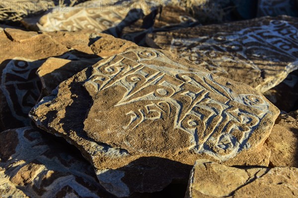 Mani stone with mantra 'Om Mani Padme Hum'