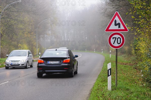 Traffic signs before a curve