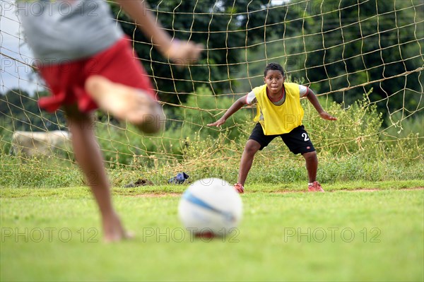 Goalkeeper focusing on the ball during a penalty kick