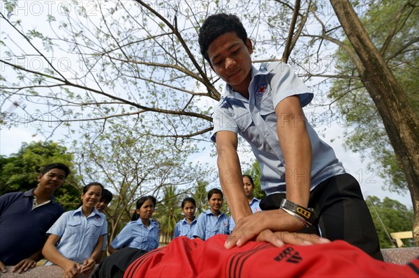 Youth performing a resuscitation procedure