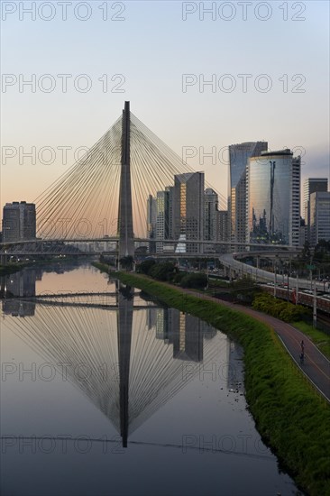 Modern skyscrapers and the Octavio Frias de Oliveira bridge over the Rio Pinheiros River