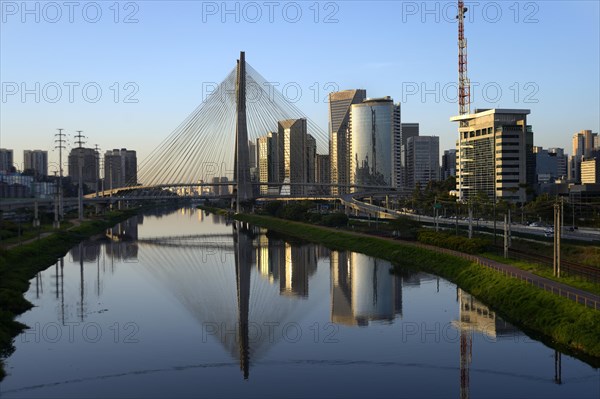 Modern skyscrapers and the Octavio Frias de Oliveira bridge over the Rio Pinheiros River