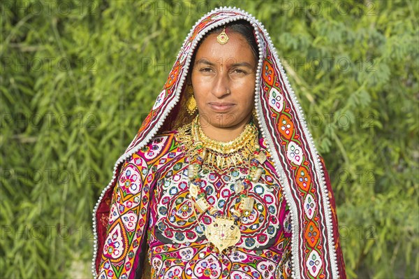 Ahir woman in traditional colorful clothes