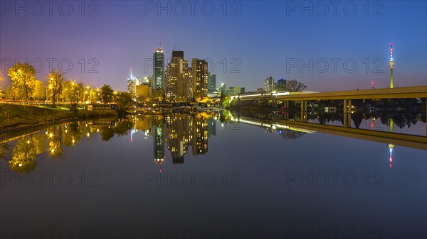 Donau City Vienna reflected in the Old Danube River