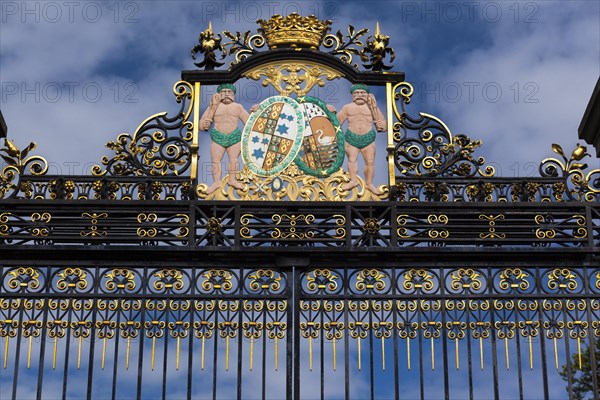 Entrance gate with a coat of arms