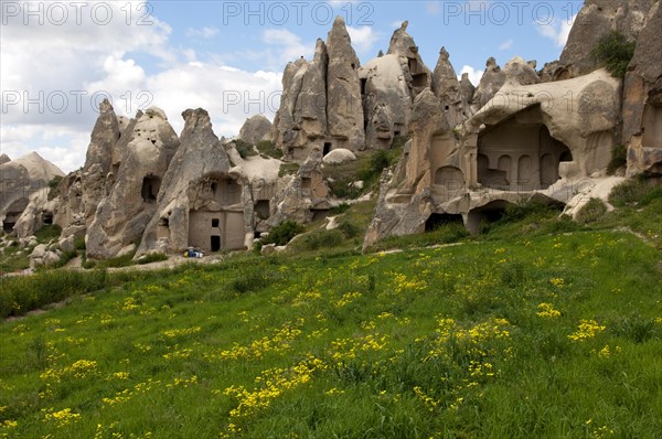 Heavily eroded tuff cones with exposed storage spaces