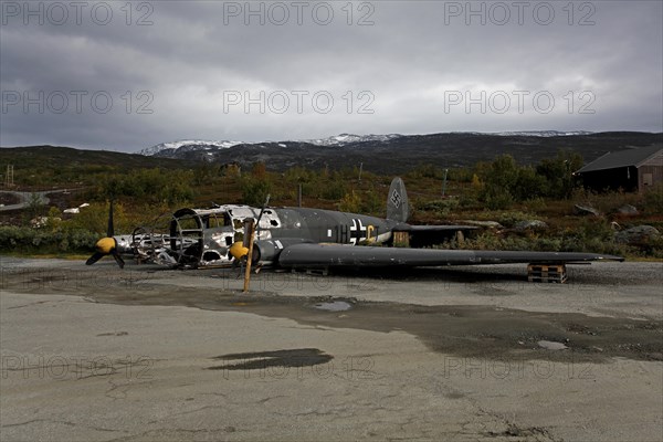 Old destroyed Nazi aircraft by the roadside