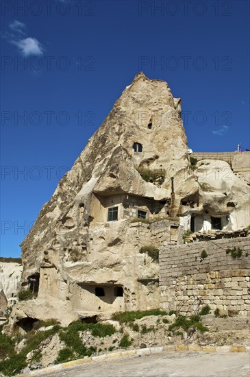 Cave dwellings in hollowed tuff rock