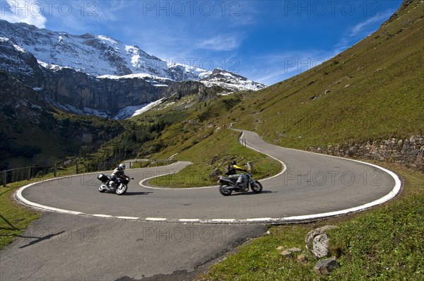 Motorcyclists in a hairpin curve