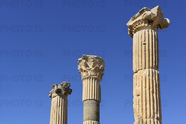 Three Corinthian columns