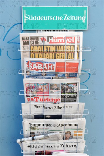 Magazine rack with German and Turkish newspapers