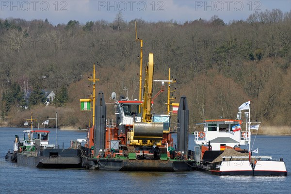 The working vessel 'Aegir' carrying a mobile backhoe