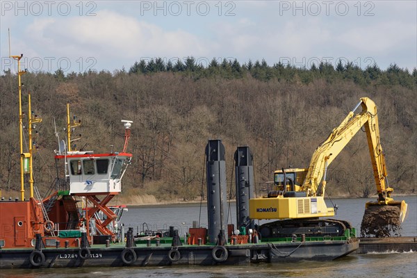 The working vessel 'Aegir' carrying a mobile backhoe