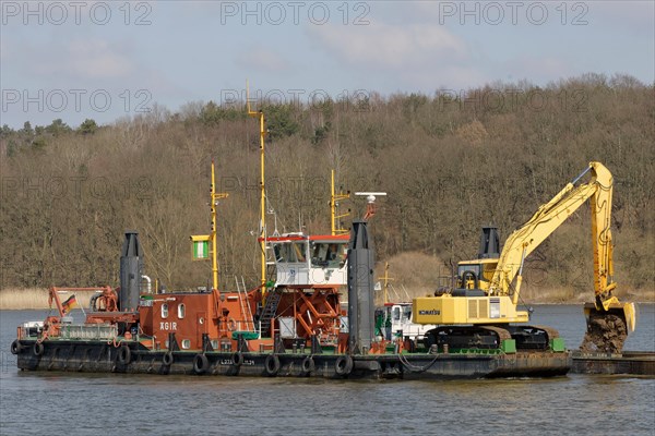 The working vessel 'Aegir' carrying a mobile backhoe