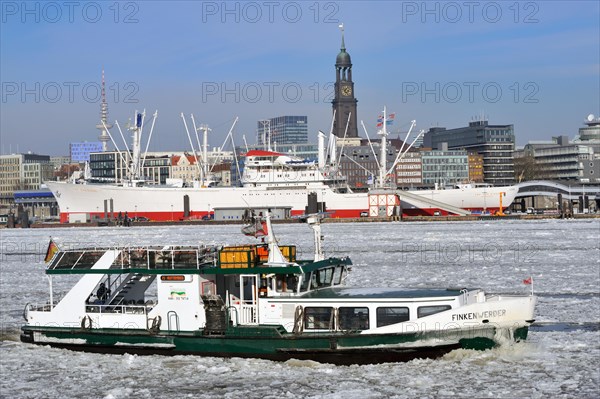 Port of Hamburg ferry Finkenwerder in front of Cap San Diego