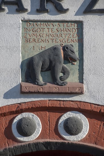 Coat of Arms with bear-relief and inscription