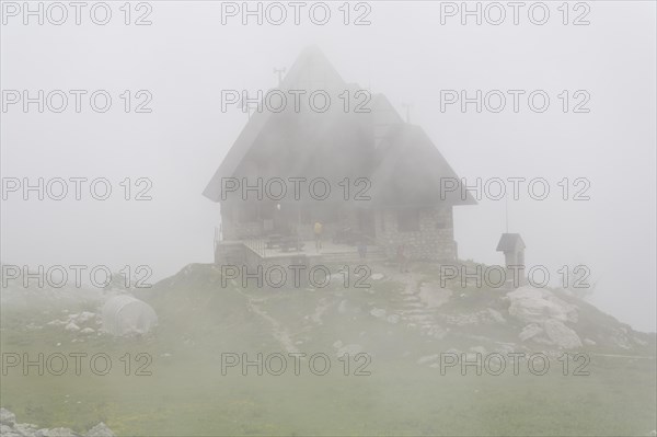 Rifugio Garelli mountain hut in the fog