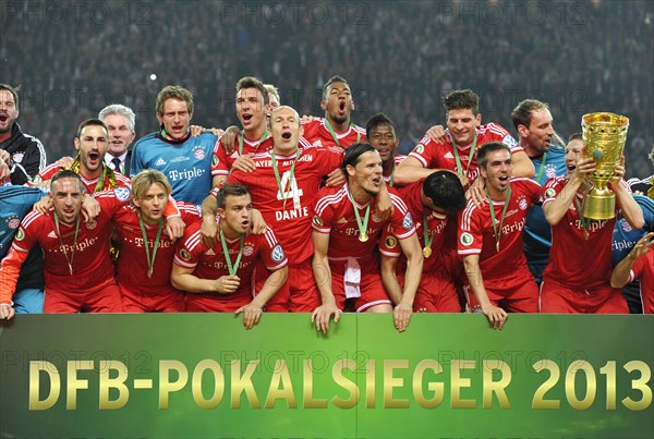 FC Bayern celebrating their triple victory