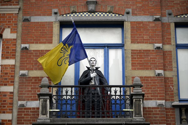 Dracula figure greeting from the balcony of the Musee d'Art Fantastique