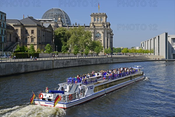 Passenger boat on the Spree River in the Government District