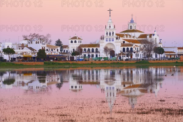 El Rocio village and Ermita del Rocio hermitage at sunset