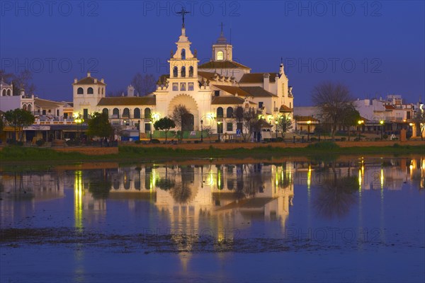 El Rocio village and Ermita del Rocio hermitage at dusk