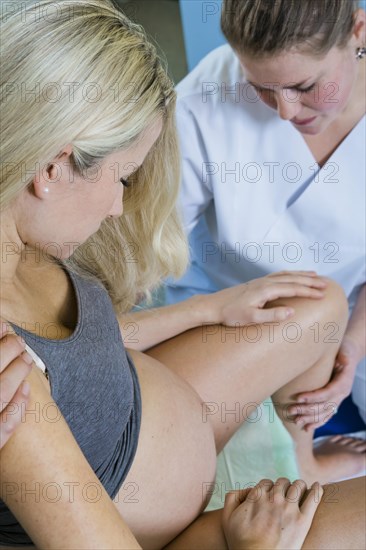 Man and woman in the delivery room during childbirth