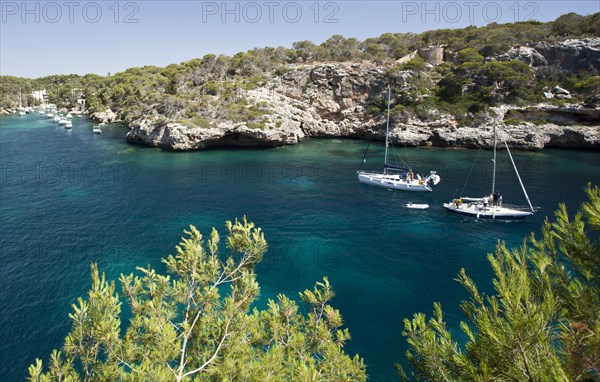 Sailing boats at the harbour entrance of Figuera