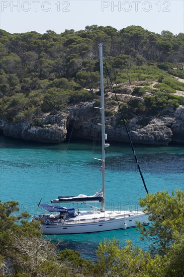 Sailing boat at the harbour entrance of Figuera