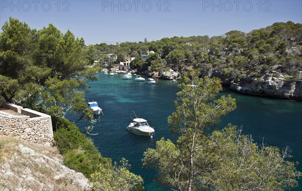 Sailing boats at the harbour entrance of Figuera