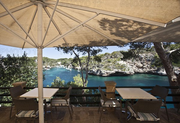 Cafe overlooking the harbour entrance of Figuera