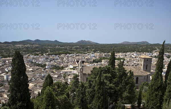 Church of Sant Salvador behind cypresses