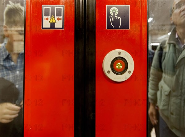 Button to open a train door