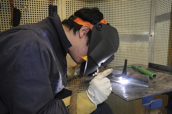 Man welding at a vocational school