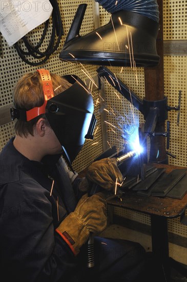 Man welding at a vocational school