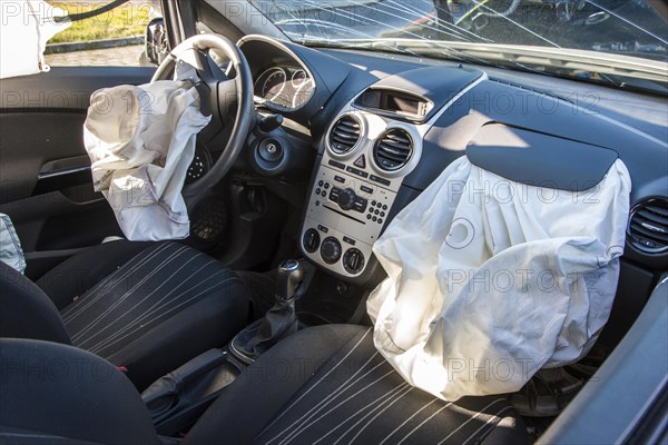 Deployed airbags in a car after a traffic accident