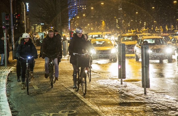 Cyclists with sleet