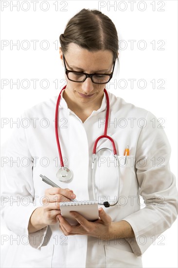 Female doctor taking notes