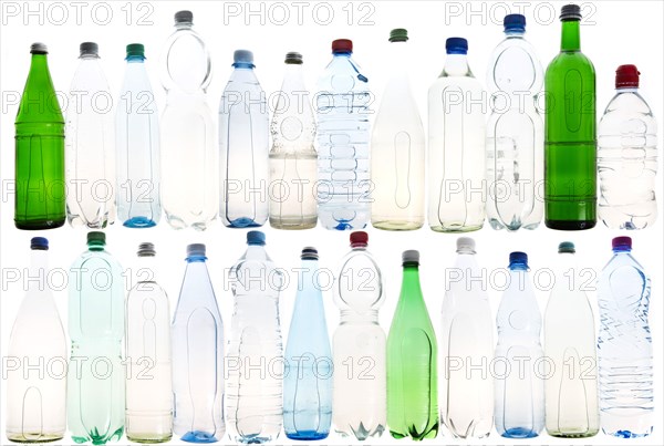 Different varieties of mineral water in bottles made of glass and plastic or PET