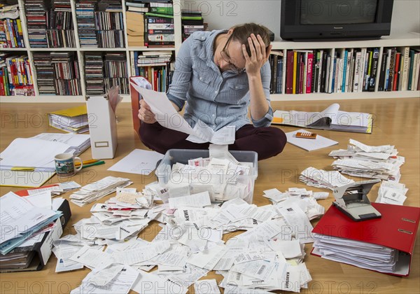 Woman sorting documents