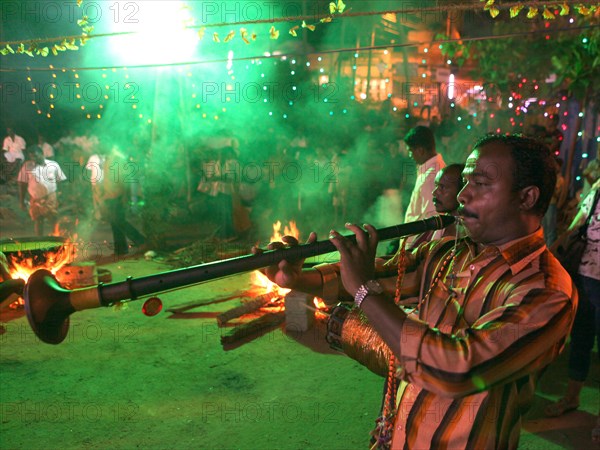 Musician playing a wind instrument