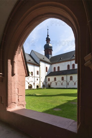 The crossing tower with a Welsh canopy and the north facade of the three-aisled Romanesque basilica