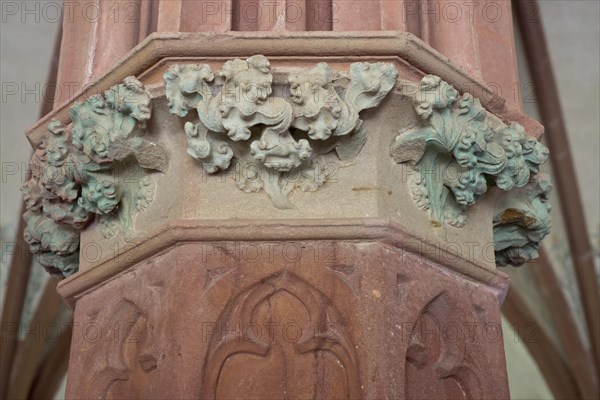 Gothic capital with floral ornaments made of sandstone