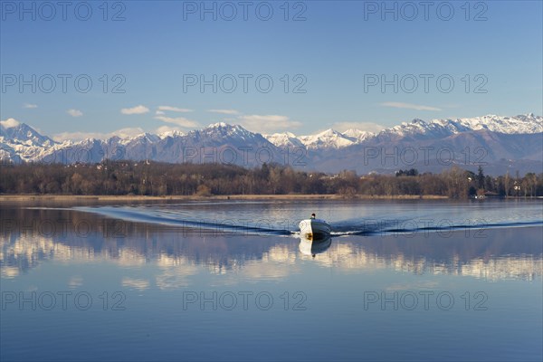 Fisherman with his boat on the Lago di Varese