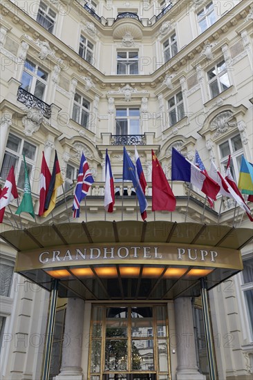 Hotel entrance with international flags