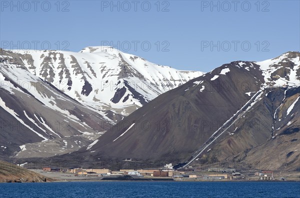 Abandoned Russian mining town of Pyramiden with the entrance to a coal mine