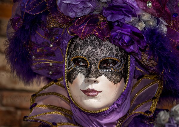 Masked woman at the Carnival in Venice