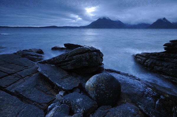 Mountains shrouded with clouds